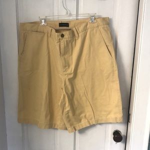 Butter yellow shorts with 2 front deep side pockets, and 2 back button pockets.